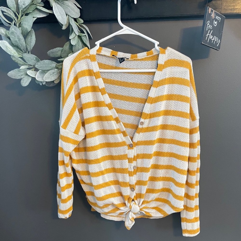 Knitted yellow and white sweater